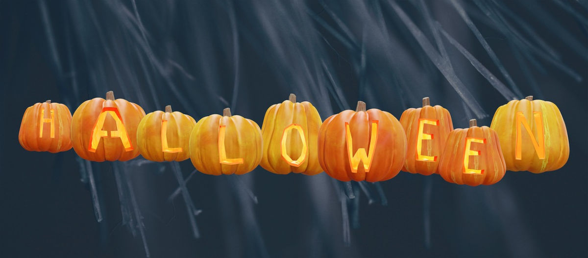 A string of carved pumpkins spells out Halloween